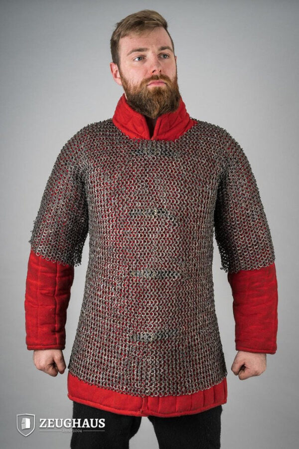 Camiseta de malla plana con anillos remachados de titanio de 9 mm.